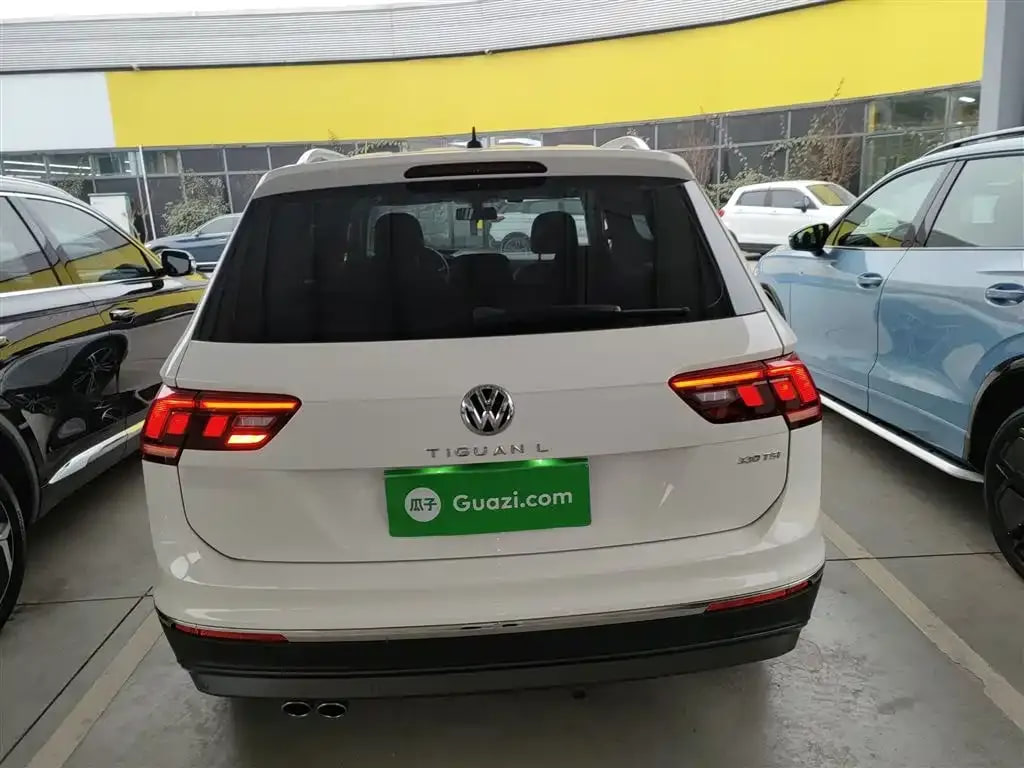 Volkswagen Tiguan L — фото 11