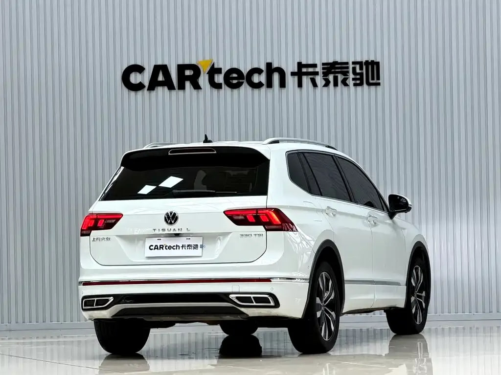 Volkswagen Tiguan L — фото 11
