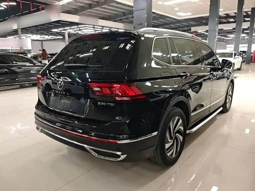 Volkswagen Tiguan L — фото 2