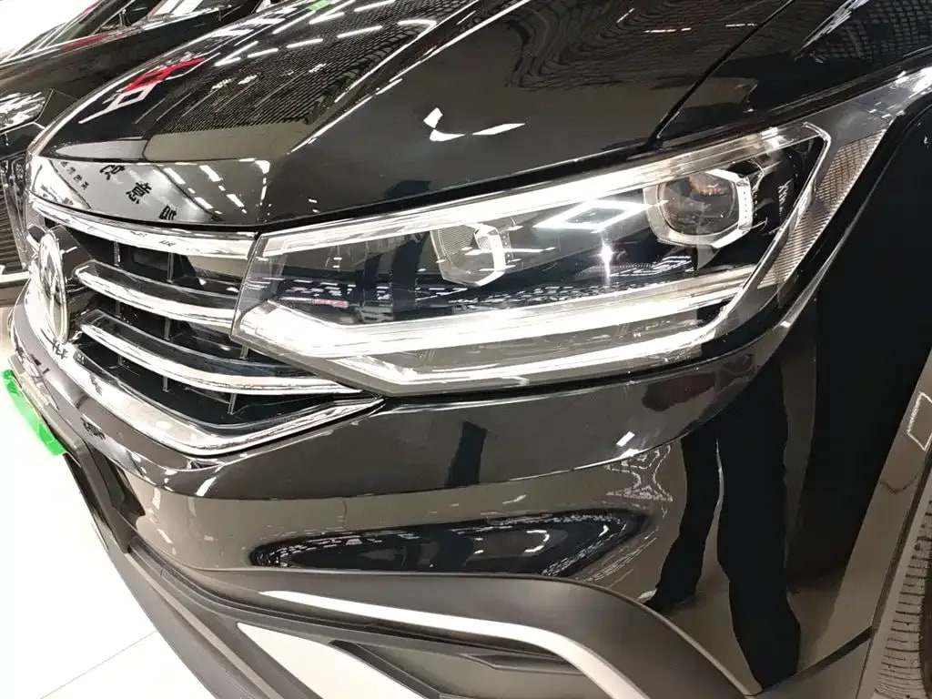 Volkswagen Tiguan L — фото 12