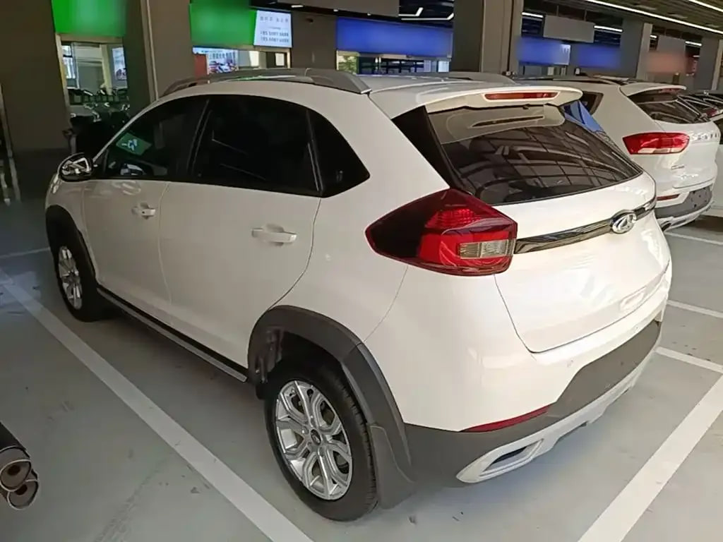 Chery Tiggo 3X — фото 6
