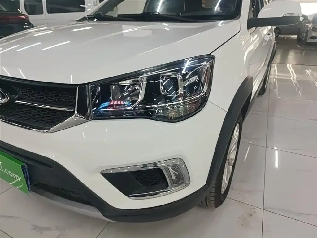 Chery Tiggo 3X — фото 11
