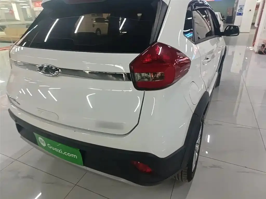 Chery Tiggo 3X — фото 12
