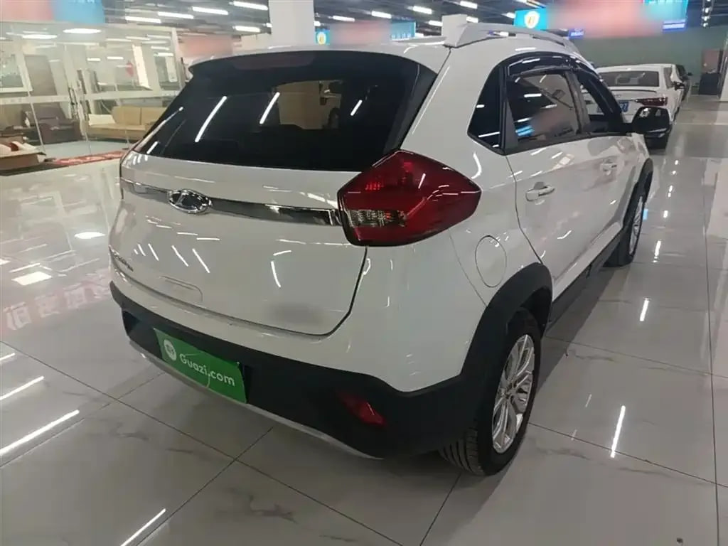 Chery Tiggo 3X — фото 15