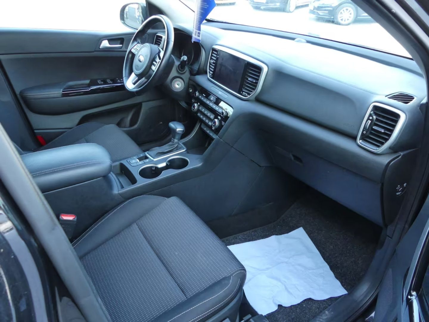 Kia Sportage — фото 11
