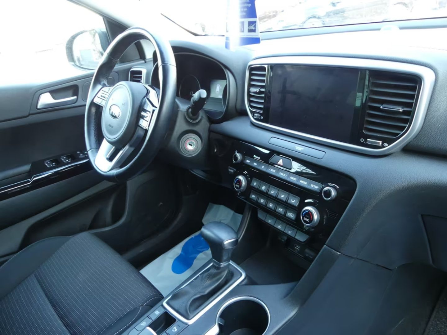 Kia Sportage — фото 12