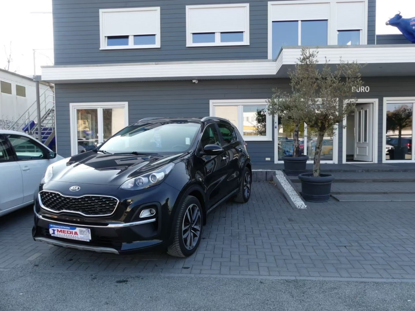 Kia Sportage — фото 13