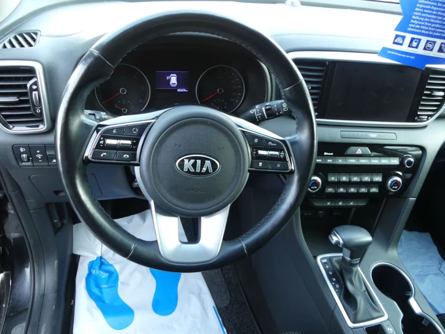 Kia Sportage — фото 14