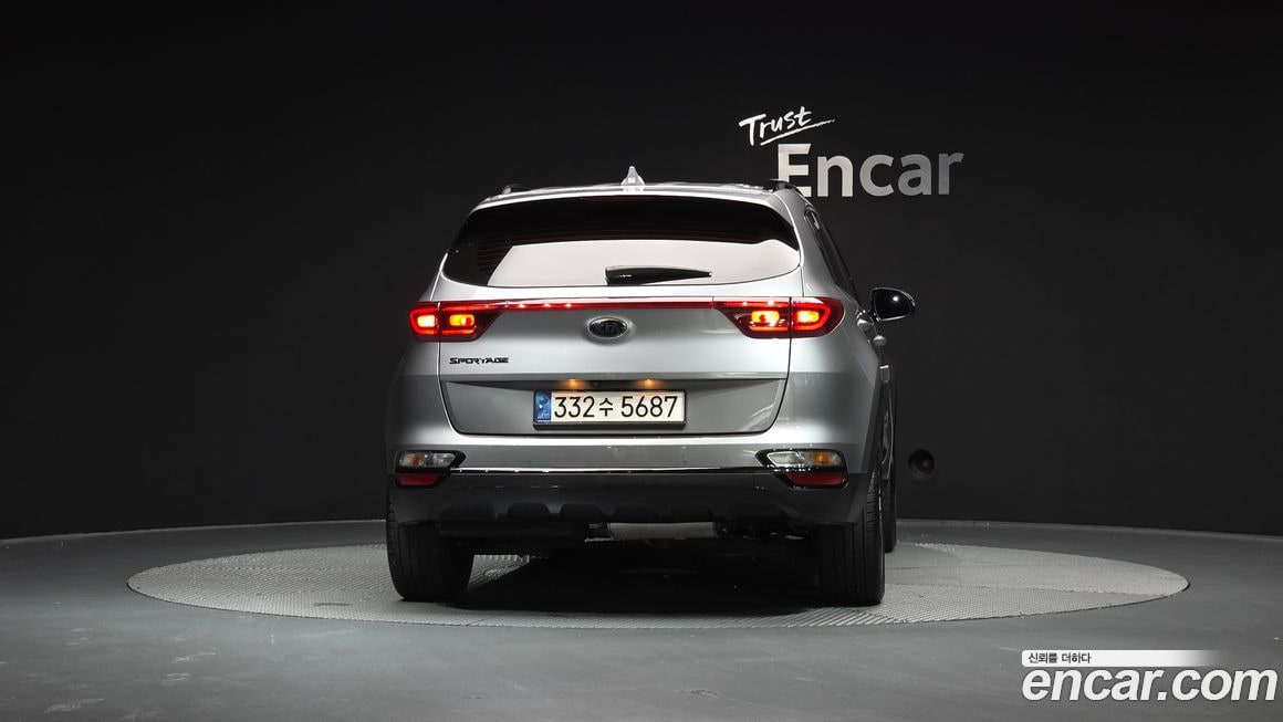 Kia Sportage — фото 7