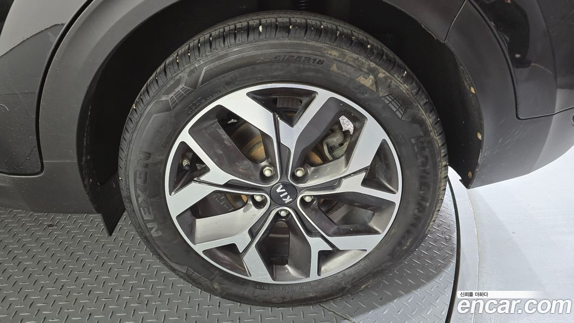 Kia Sportage — фото 7
