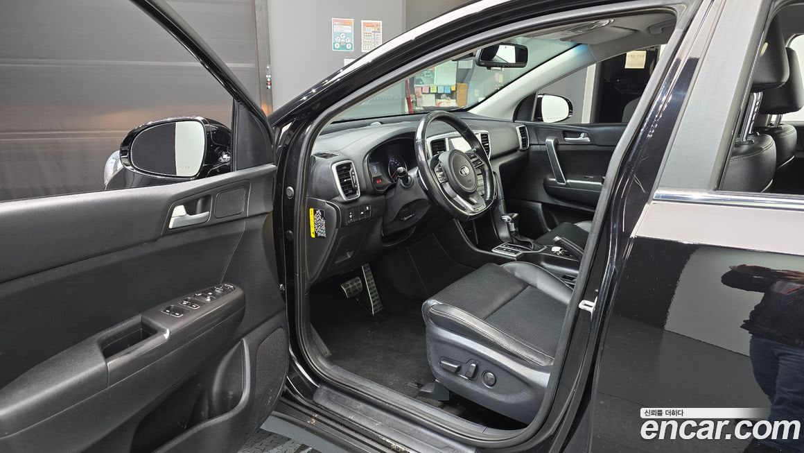 Kia Sportage — фото 8