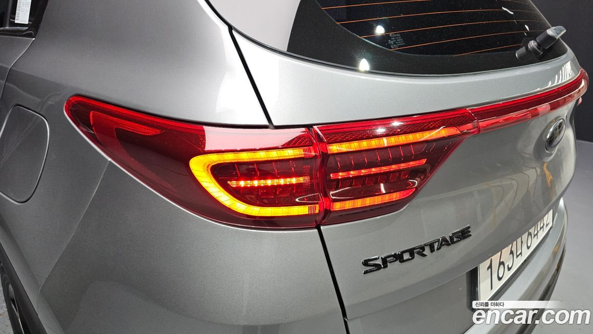Kia Sportage — фото 8