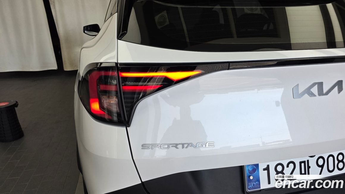 Kia Sportage — фото 13